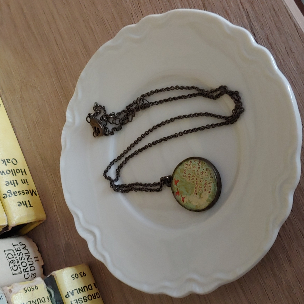 Round pendent necklace with JJ Heller lyrics